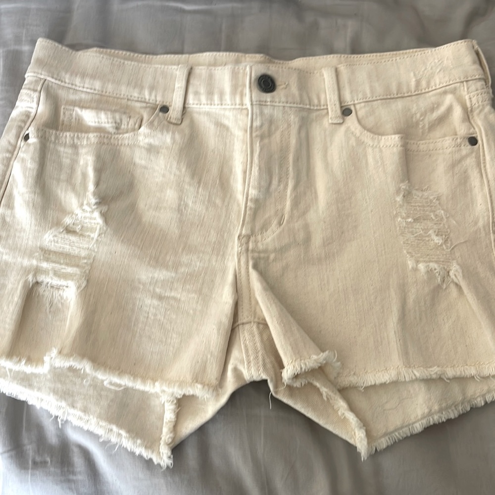 Never worn off white jean shorts size 27